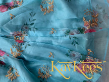 Load image into Gallery viewer, Collection Aarna - Aqua Blue with all-over Flower Prints with Gold Embroidered Organza Lehenga with Bright Pink Dupion Silk Blouse
