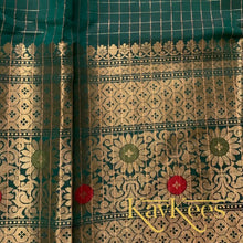 Load image into Gallery viewer, Collection Chakori - Green Checks-patterned Skirt having a long Benarasi Border with Bright Red Embroidered Dupion Blouse
