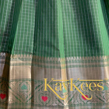 Load image into Gallery viewer, Collection Chakori - Forest Green Checks-patterned Skirt having a long Benarasi Border with Bright Red Embroidered Blouse
